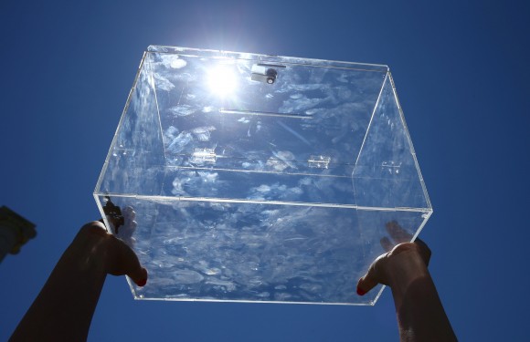 FILE PHOTO - A volunteer shows a ballot box after a pro-independence rally in Barcelona, Spain June 11, 2017. (Reuters/Albert Gea/File Photo)
