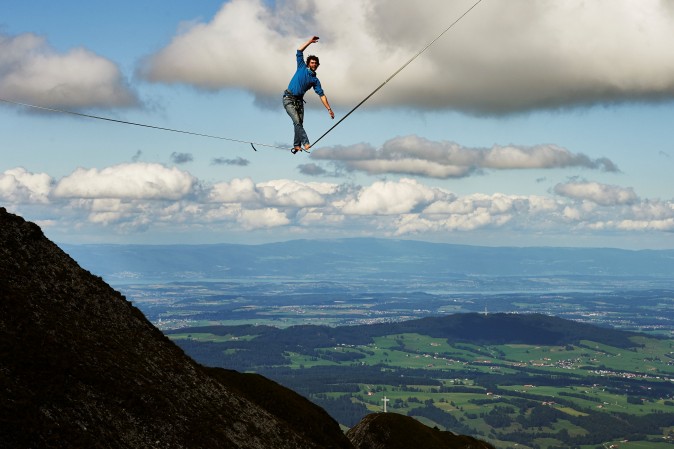 Daniel Laruelle of South Africa walks on a line during the Highline Extreme event in Moleson peak, Switzerland ,on Sept. 15, 2017.  Fifty of the Worlds best slackliners compete till the 17th on six different lines ranging from 45 metres to 304 metres.  (MICHAEL BUHOLZER/AFP/Getty Images)