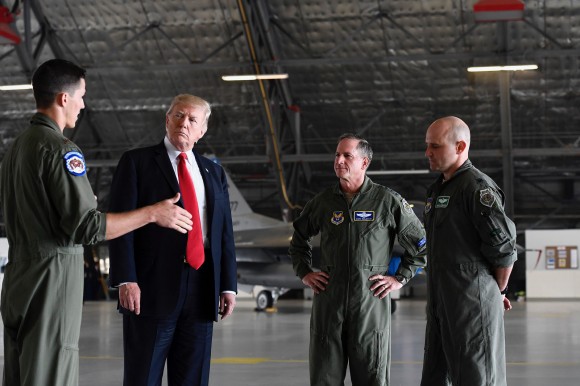 Maj. Matt "Fitty" Tucker, left, describes aspects of the F-35A Lightning II with President Donald Trump, along with Air Force Chief of Staff Gen. David L. Goldfein and Lt. Col. Nick "Miles" Edwards, on Sept. 15, 2017, on Joint Base Andrews, Md. (U.S. Air Force photo by Scott M. Ash)