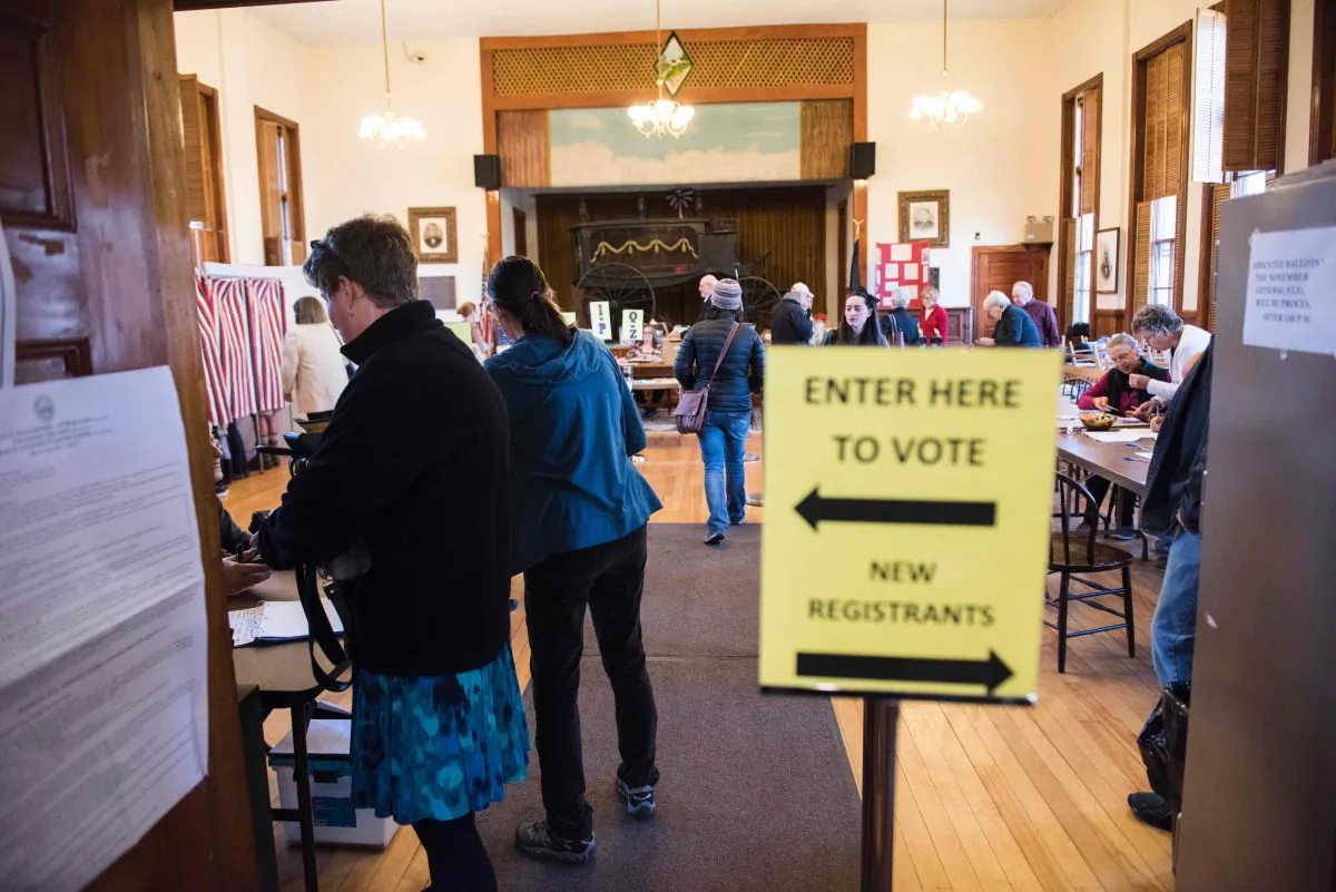 Voters cast their ballots in the presidential election at the Sutton town hall in Sutton, N.H., on Nov. 8, 2016. (Ryan McBride/AFP/Getty Images)