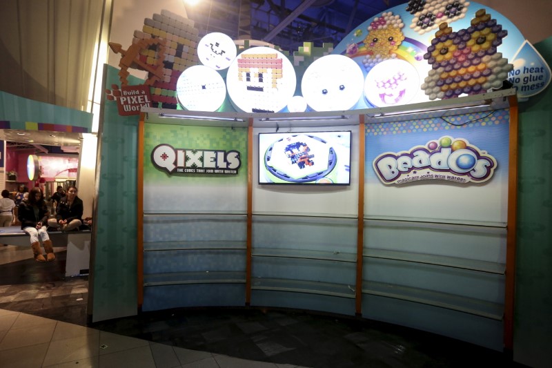 The mostly empty shelves of a Toys "R" Us flagship store in Times Square are seen after it closed permanently in the Manhattan borough of New York on Dec. 30, 2015. (REUTERS/Carlo Allegri)