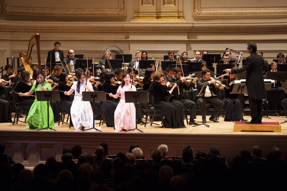 Three erhus players perform with Shen Yun Symphony Orchestra at Carnegie Hall on Oct. 18, 2015. (Courtesy of Shen Yun Performing Arts)
