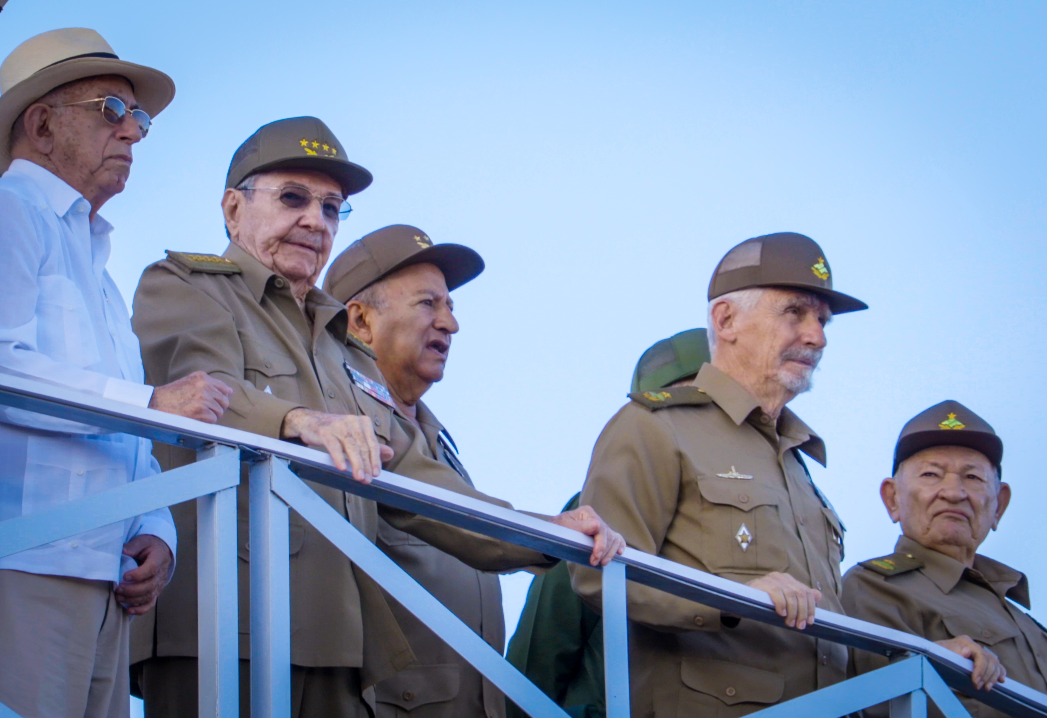 Cuban President Raul Castro (2nd-L), Cuban Vice President Jose Ramon Machado Ventura (L), Minister of the Revolutionary Armed Forces (FAR),General Leopoldo Cintra Frias (3rd-L) and Revolution Commanders, Ramiro Valdez (2nd-R) and Guillermo Garcia Frias (R) participate in a military parade in honor the death of Cuban dictator Fidel Castro at Revolution Square in Havana, on Jan. 2, 2017. (ADALBERTO ROQUE/AFP/Getty Images)