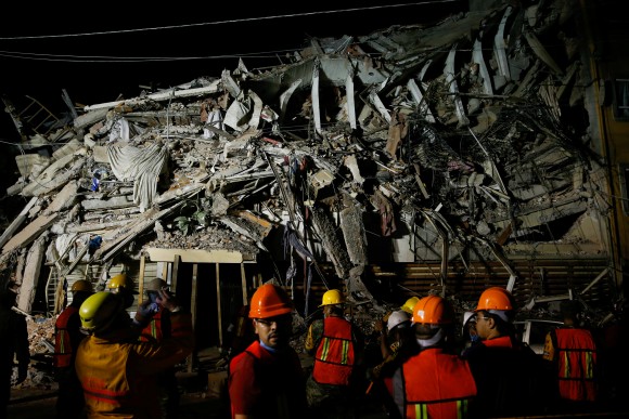 Rescuers work at the site of a collapsed building Sept. 20, 2017 after an earthquake shook Mexico City, Mexico, the day before. (Reuters/Henry Romero)