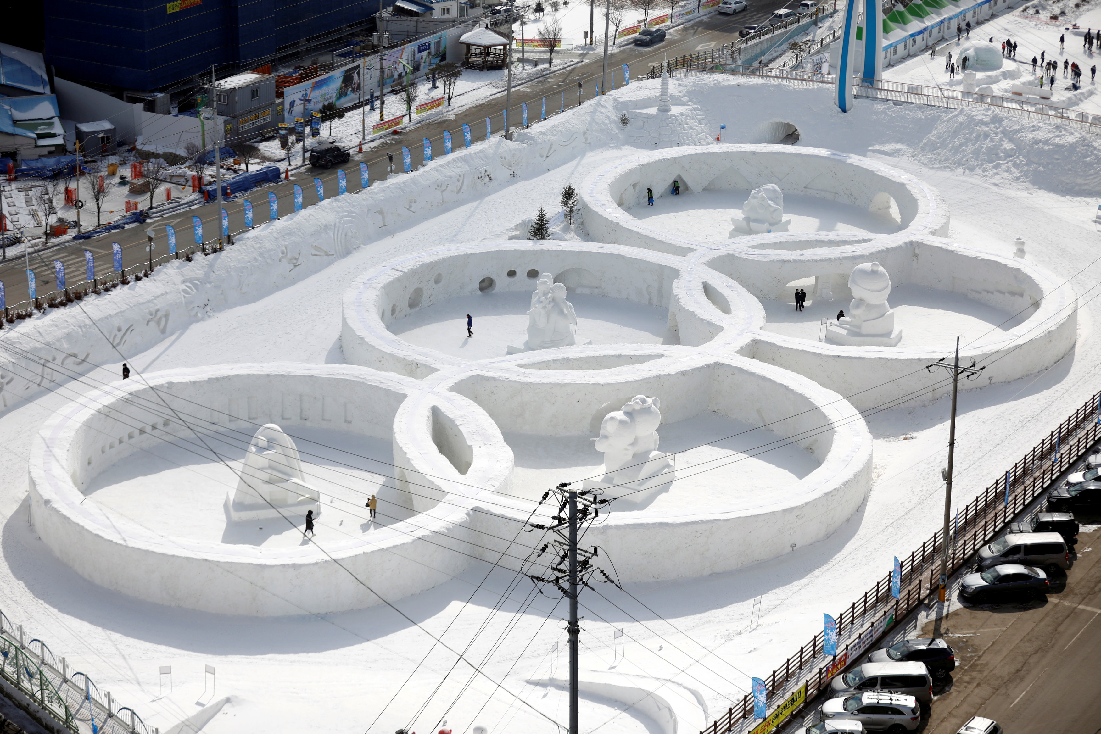 An ice sculpture of the Olympic rings is seen during the Pyeongchang Winter Festival, near the venue for the opening and closing ceremony of the PyeongChang 2018 Winter Olympic Games in Pyeongchang, South Korea on Feb. 10, 2017. (REUTERS/Kim Hong-Ji/File Photo)