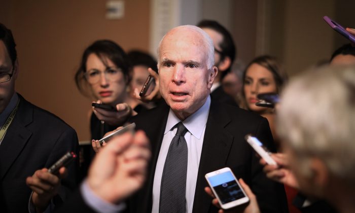 Sen. John McCain (R-Ariz.) speaks to reporters at the Capitol on July 13, 2017. McCain announced that he will not vote in favor of a Republican bill that would repeal and replace parts of Obamacare. (Chip Somodevilla/Getty Images)