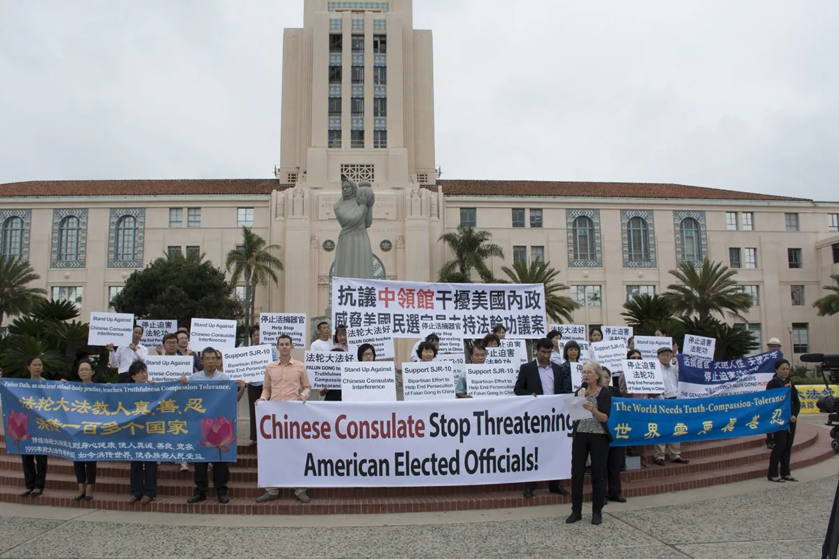 Practitioners of the spiritual group Falun Gong hold a rally at the San Diego County Administration Center on Sept. 13, calling on the Chinese Consulate to stop interfering with U.S. officials. (Mark Cao/The Epoch Times)