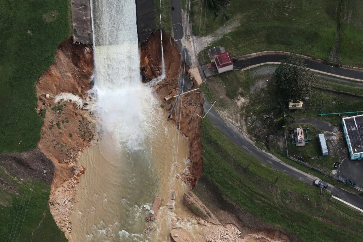 An aerial view shows the damage to the Guajataca dam in the aftermath of Hurricane Maria, in Quebradillas, Puerto Rico September 23, 2017. (Reuters/Alvin Baez)