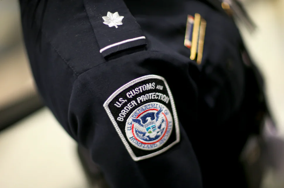 A U.S. Customs and Border Protection agent. New travel restrictions announced Sept. 24, 2017, will bar almost all citizens from seven countries to the United States indefinitely. (Joe Raedle/Getty Images)