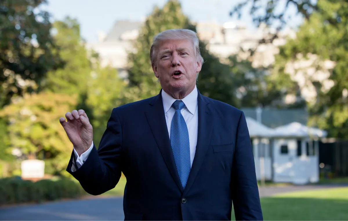 President Donald Trump addresses the media after arriving on the South Lawn of the White House in Washington, D.C., on Sept. 24, 2017. (Samira Bouaou/The Epoch Times)