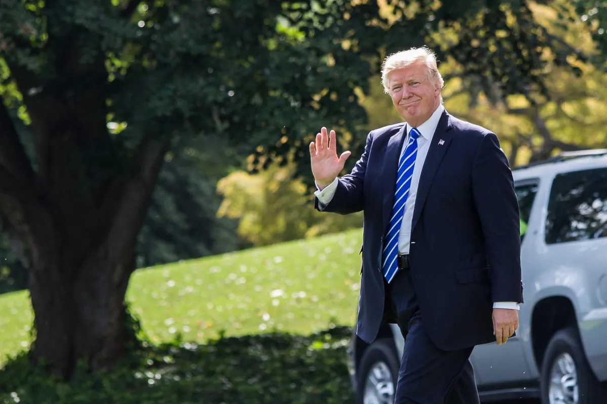 President Donald Trump walks to the South Lawn of the White House to board the Marine One on Sept. 26, 2017. (Samira Bouaou/The Epoch Times)