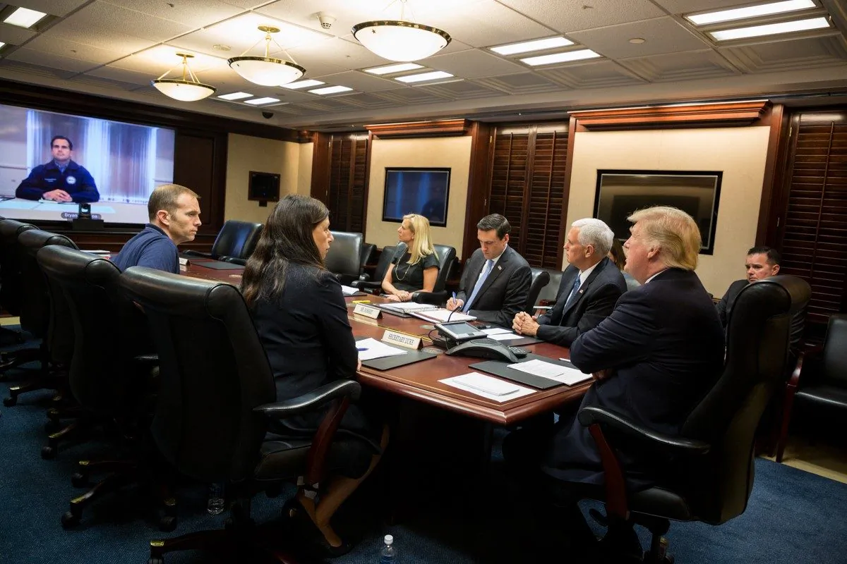 President Donald Trump, joined by Vice President Mike Pence (2nd R), White House Homeland Security Adviser Tom Bossert (3rd R); Acting U.S. Secretary of Homeland Security Elaine Duke (2nd L), and FEMA Administrator Brock Long,(L), speaks with Puerto Rico’s Gov. Ricardo A. Rosselló on a video teleconference in the Situation Room at the White House on Sept. 26, 2017. (Official White House Photo by Shealah Craighead)