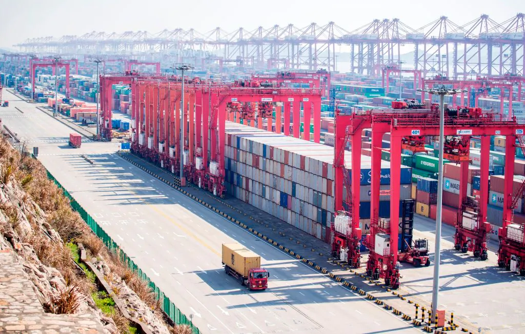 Containers organized in stacks at Yangshan Deep Water Port, part of the Shanghai Pilot Free Trade Zone in Shanghai on Feb. 13, 2017. (JOHANNES EISELE/AFP/Getty Images)