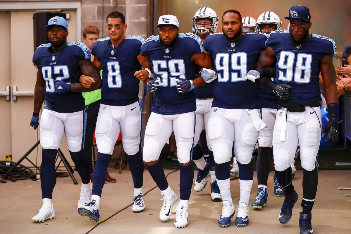 Tennessee Titans players walk onto the field before taking on the Seattle Seahawks at Nissan Stadium on Sept. 24, 2017, in Nashville, Tenn. (Far L) Delanie Walker No. 82.
(Wesley Hitt/Getty Images)