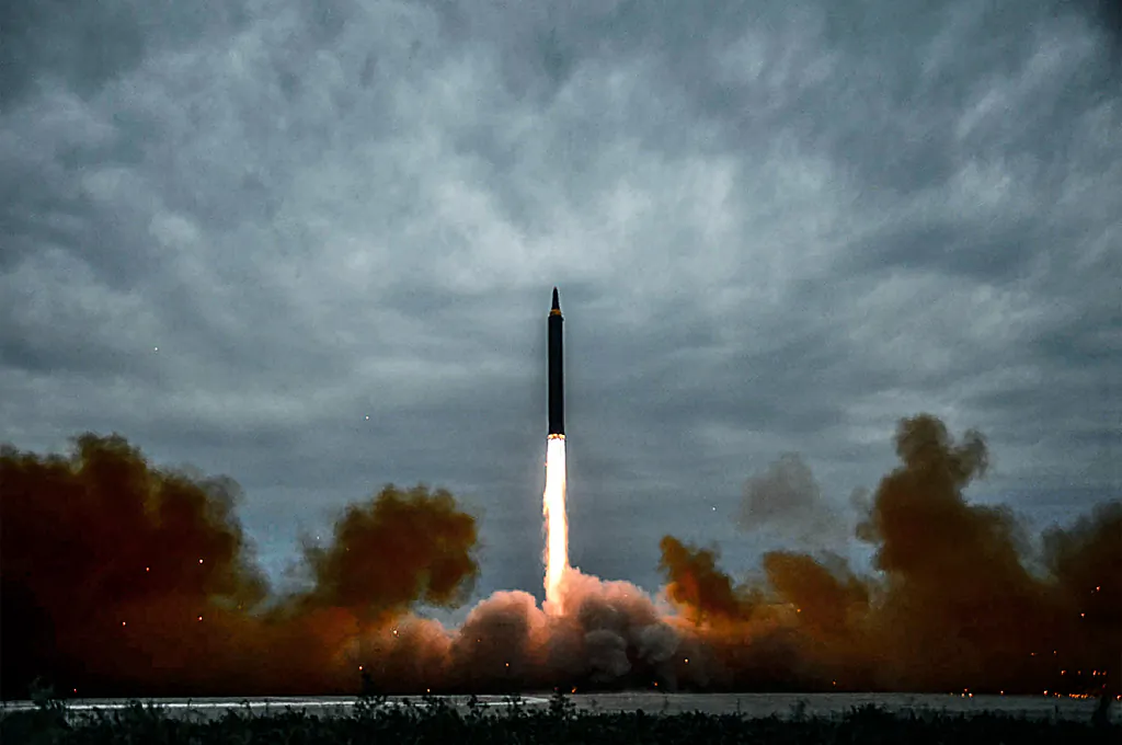 A launch test of North Korea’s intermediate-range ballistic missile Hwasong-12 at an undisclosed location near Pyongyang, in a photo released by North Korea’s official Korean Central News Agency on Aug. 30. (STR/AFP/Getty Images)