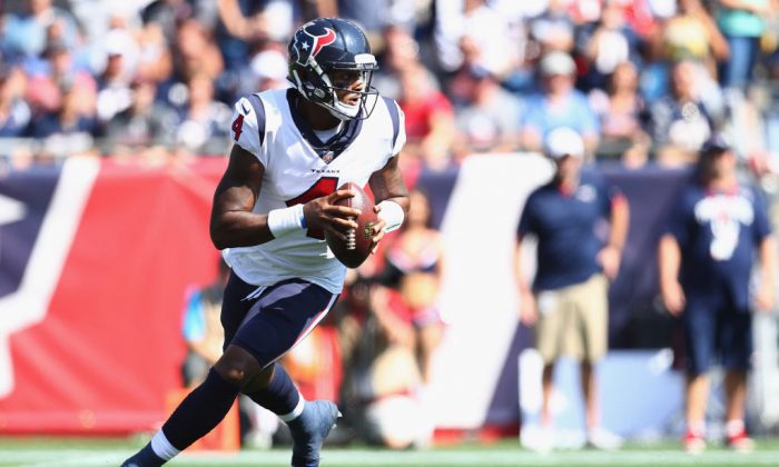 Deshaun Watson of the Houston Texans looks to throw during the first quarter of a game against the New England Patriots at Gillette Stadium n Foxboro, Mass., on Sept. 24, 2017. (Maddie Meyer/Getty Images)