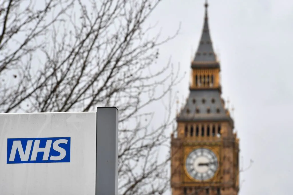 An NHS sign is pictured outside St Thomas' Hospital, near the Houses of Parliament, in central London, on March 8, 2017. (Ben Stansall/AFP/Getty Images)