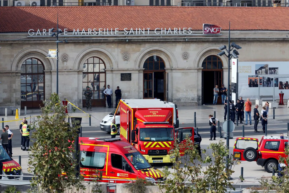 Emergency services vehicles are seen outside the Saint-Charles train station after French soldiers shot and killed a man who stabbed two women to death at the main train station in Marseille, France on Oct. 1, 2017. (REUTERS/Jean-Paul Pelissier)