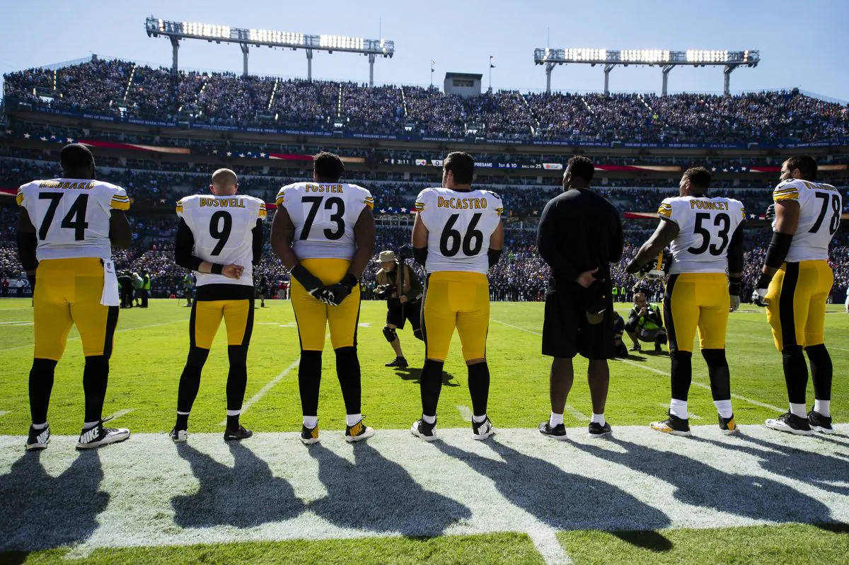 Members of the Pittsburgh Steelers stand for the national anthem before a game against the Baltimore Ravens at M&T Bank Stadium in Baltimore, Md., on Oct. 1, 2017. (Patrick McDermott/Getty Images)