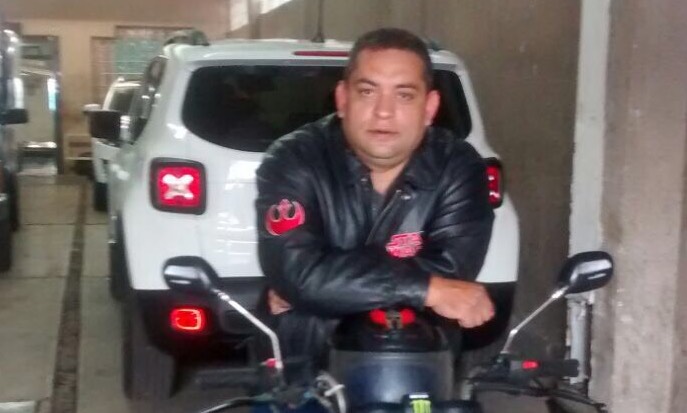 Jaime Uribe Rosales, 44, sits atop his motorcycle in the parking garage of 168 Bolivar in Mexico City. The building collapsed during the earthquake on Sept. 19, trapping Rosales after he evacuated 25 from the building and returned in an effort to find his wife, who rode out the collapse by clinging to an antenna on the building's roof. (Courtesy of the family)