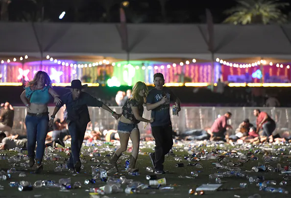 People run from the Route 91 Harvest country music festival after gun fire was heard in Las Vegas on Oct. 1, 2017. (David Becker/Getty Images)