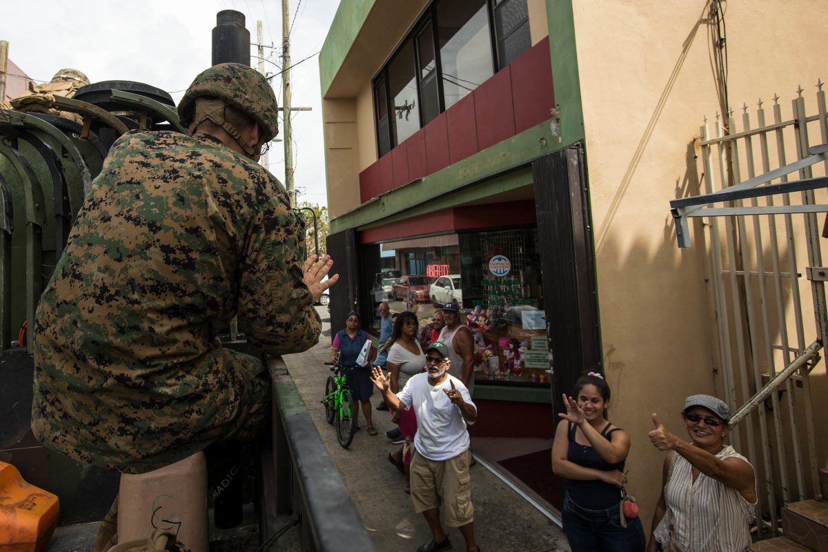 170927-M-CA957-0127 HUMACAO, Puerto Rico (Sept. 27, 2017) U.S. Marine Corps 1st Lt. Charles V. McCole, an officer with the Air Traffic Control Mobile Team of the 26th Marine Expeditionary Unit (26th MEU), waves to local residents during departure from Humacao Hospital after conducting a medical and operational needs assessment as part of Hurricane Maria relief efforts in Humacao, Puerto Rico, Sept. 27, 2017. The Department of Defense is supporting the Federal Emergency Management Agency, the lead federal agency, in helping those affected by Hurricane Maria to minimize suffering and is one component of the overall whole-of-government response effort. (U.S. Marine Corps photo by Lance Cpl. Tojyea G. Matally/Released)