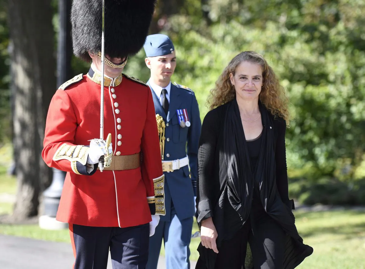 Gov. Gen. Julie Payette inspects the Guard of Honour during a ceremony at Rideau Hall in Ottawa after being installed as Canada's 29th Governor General, Oct. 2, 2017. (The Canadian Press/Justin Tan)