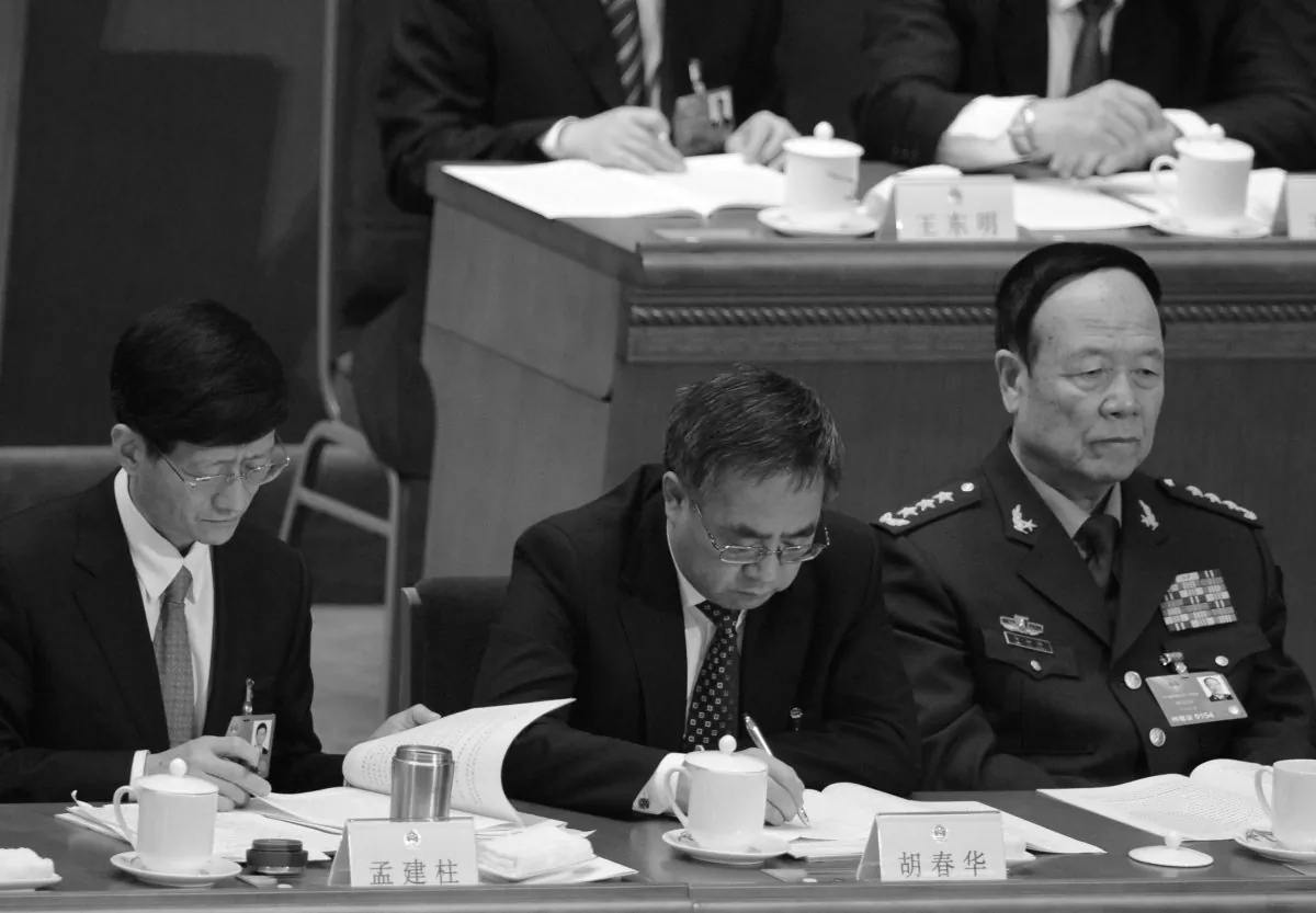 Former vice chairman of the Central Military Commission, Guo Boxiong, at far right, on March 5, 2013. (Goh Chai Hin/AFP/Getty Images)