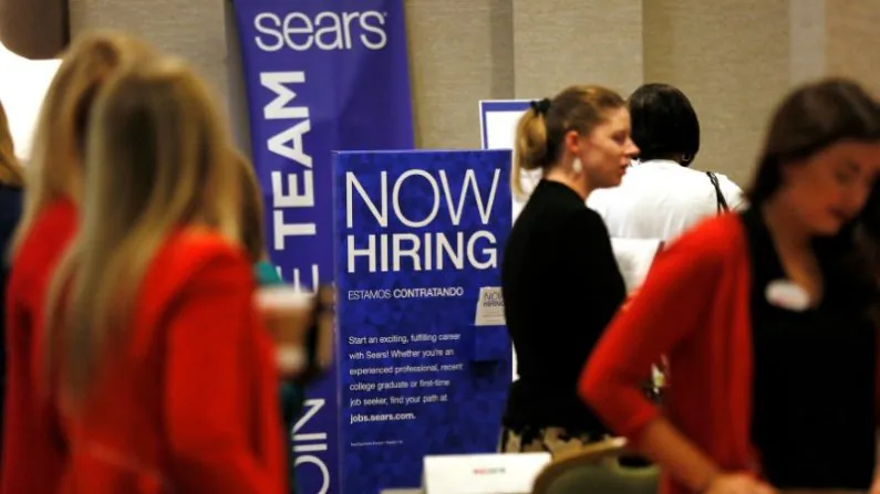 Recruiters and job seekers are seen at a job fair in Golden, Colorado, June 7, 2017. (REUTERS/Rick Wilking)