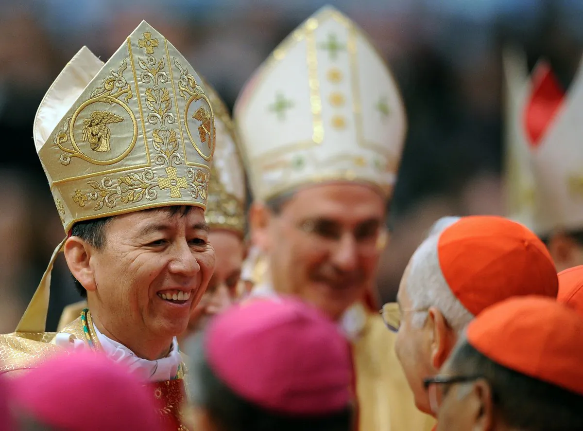 Archbishop Savio Hon Tai-Fai the Secretary of the Congregation for the Evangelization of Peoples has been removed from his powerful post by Pope Francis. This stock photo shows then-Bishop Hon surrounded by prelates during a holy mass celebrated by Pope Benedict XVI at the Vatican on Feb. 5, 2011. (Alberto Pizzoli/AFP/Getty Images)