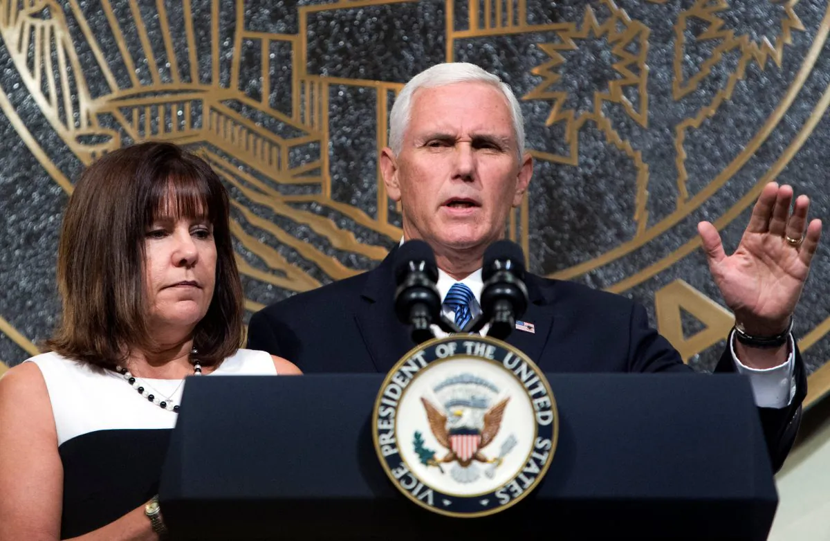 U.S. Vice President Mike Pence is joined by his wife, Karen, as he speaks in Las Vegas City Hall following a Unity Prayer Walk in Las Vegas, Nevada on Oct. 7, 2017. (REUTERS/Las Vegas Sun/Steve Marcus)