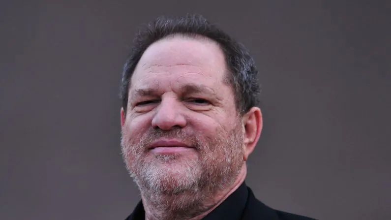 U.S. film producer Harvey Weinstein at the Burberry Prorsum show during the 2014 Autumn/Winter London Fashion Week in London on Feb. 17, 2014. (CARL COURT/AFP)