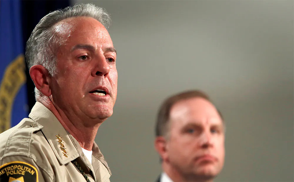 Clark County Sheriff Joe Lombardo responds to a question during a media briefing at the Las Vegas Metro Police headquarters in Las Vegas, Nevada, U.S. October 3, 2017. Aaron Rouse, FBI Special Agent in Charge of the Las Vegas Division, looks on at right. (Reuters/Las Vegas Sun/Steve Marcus)