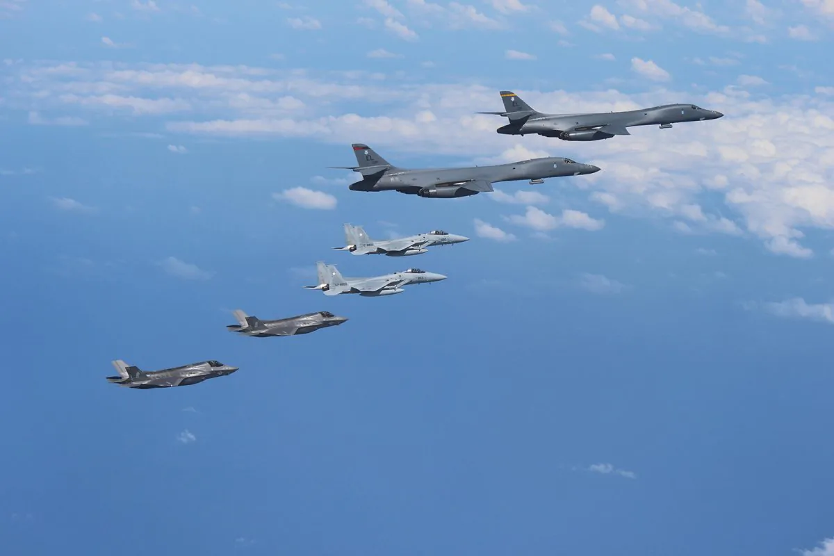 U.S. Marine Corps F-35B Lightning II stealth fighters fly alongside two U.S. Air Force B-1B Lancers assigned before joining up with two Koku Jieitai (Japan Air Self-Defense Force) F-15J fighters in Japanese airspace near Kyushu, Japan, on Aug. 31, 2017. (Japan Air Self-Defense Force)