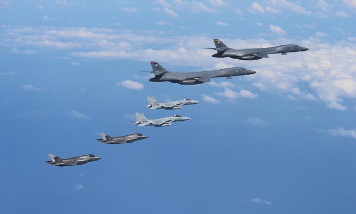 U.S. Marine Corps F-35B Lightning II stealth fighters fly alongside two U.S. Air Force B-1B Lancers assigned before joining up with two Koku Jieitai (Japan Air Self-Defense Force) F-15J fighters in Japanese airspace near Kyushu, Japan, on Aug. 31, 2017. (Japan Air Self-Defense Force)