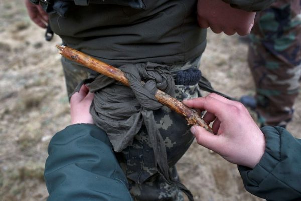 Ukrainian National Guardsmen practice using improvised tourniquets under the supervision of American soldiers during Operation Fearless Guardian on April 21, 2015 at the International Peacekeeping and Security Center near Yavoriv, Ukraine. (Pete Kiehart/Getty Images)