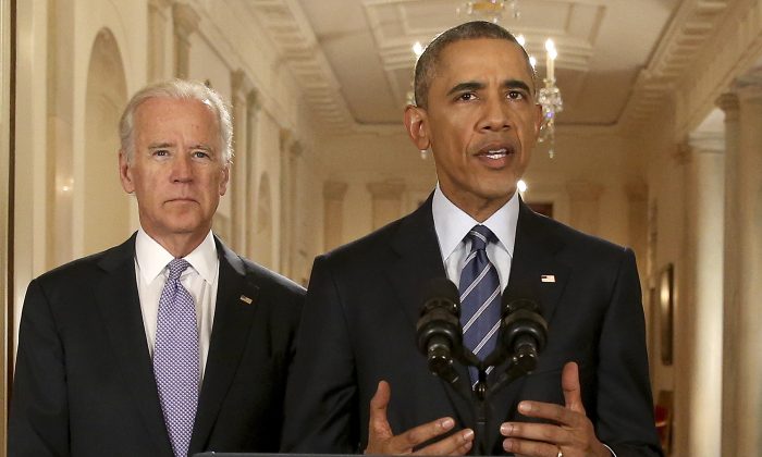 President Barack Obama, standing with Vice President Joe Biden to talk about the Iran Nuclear Deal on July 14, 2015. (Andrew Harnik/Pool/Getty Images)