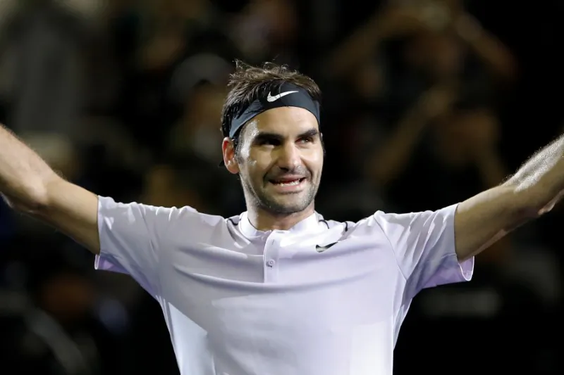 Roger Federer of Switzerland celebrates winning against Rafael Nadal of Spain. (Reuters/Aly Song)