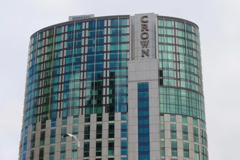 The logo of Australian casino giant Crown Resorts Ltd. adorns the hotel and casino complex in Melbourne, Australia, on June 13, 2017. (REUTERS/Jason Reed/File Photo)
