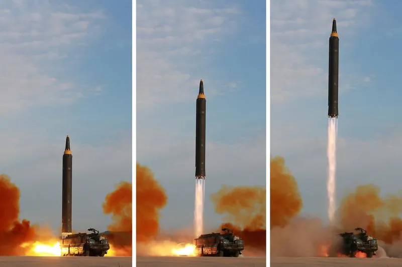 The Hwasong-12 missile in this undated combination photo released by North Korea's Korean Central News Agency (KCNA) on September 16, 2017. A Hwasong-12 flew over Hokkaido, the second largest island of Japan, on a North Korean test launch on Sept 15. (KCNA via Reuters)