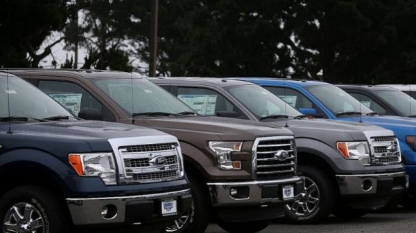New Ford F-150 pickups are displayed on the sales lot at Serramonte Ford on April 28, 2015 in Colma, California. (Justin Sullivan/Getty Images)