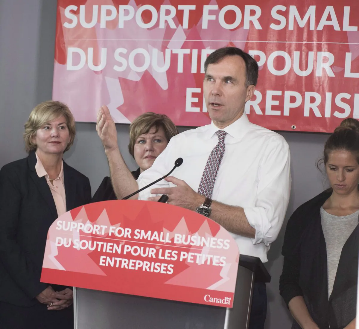 Finance Minister Bill Morneau speaks to local business owners and media during a press conference at Station 33 Cafe & Yoga in Hampton, N.B., on Oct. 18, 2017. (The Canadian Press/Stephen MacGillivray)
