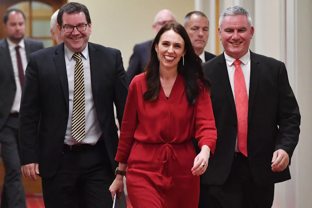 New Zealand Prime Minister Jacinda Ardern (C) arrives at a press conference with MPs Kelvin Davis (R) and Craig Robertson at Parliament in Wellington on Oct. 19, 2017.(MARTY MELVILLE/AFP/Getty Images)