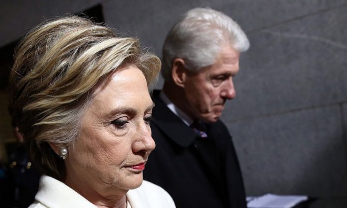 Former Democratic presidential nominee Hillary Clinton (L) and former President Bill Clinton arrive on the West Front of the U.S. Capitol in Washington on Jan. 20, 2017. (Win McNamee/Getty Images)