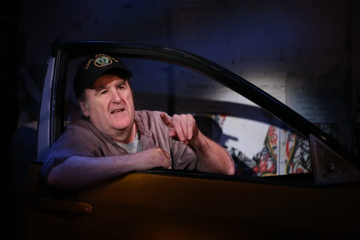 John McDonagh in this one-man show “Off the Meter, on the Record.” (Carol Rosegg)