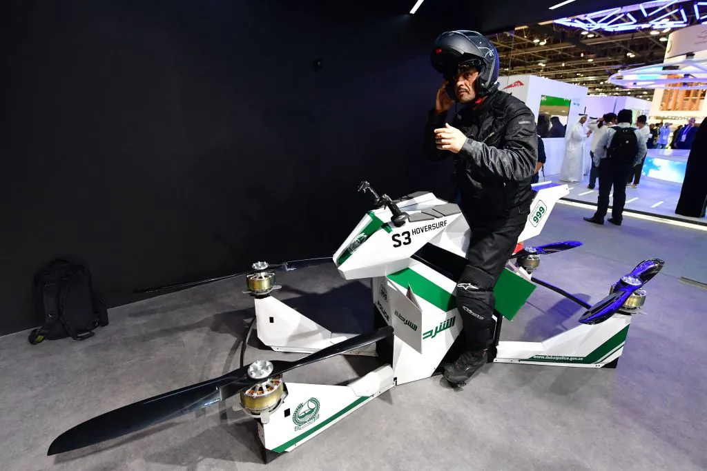 An Emirati police officer sits on a drone motorcycle at the Gitex 2017 exhibition at the Dubai World Trade Centre in Dubai on Oct.8, 2017. (Giuseppe Cacace/AFP/Getty Images)