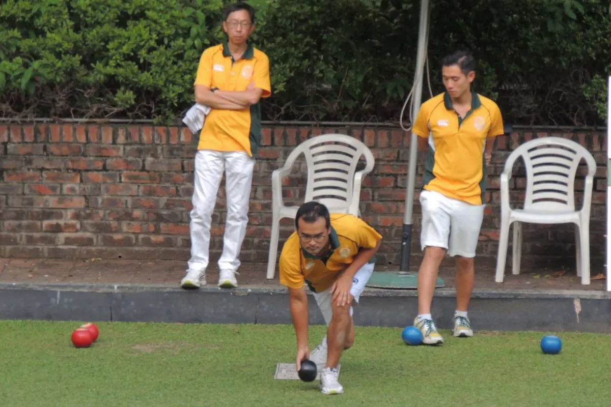 Craigengower Cricket Club’s Robin Chok (delivering), who played as Third for Kevin Fung’s team, stays focused during the game against the Hong Kong Youth Team. They won a six in the last end to tie the game.  The result was enough for CCC to win the men’s Premier League Division 1 title for the second consecutive year. (Karen Tang)