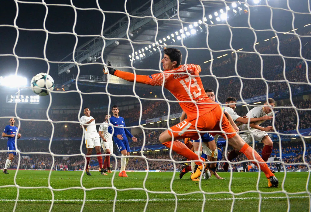 Edin Dzeko of AS Roma scores his second and Roma's 3rd goal past Thibaut Courtois of Chelsea during the UEFA Champions League group C match between Chelsea FC and AS Roma at Stamford Bridge on Oct 18, 2017 in London, United Kingdom. The match finished 3-3. (Dan Mullan/Getty Images)