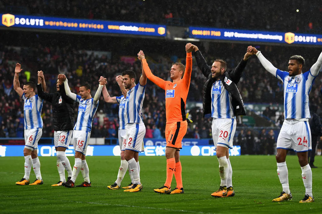 Huddersfield Town players celebrate after winning the Premier League match between Huddersfield Town and Manchester United at John Smith's Stadium on Oct 21, 2017 in Huddersfield, England. (Gareth Copley/Getty Images)