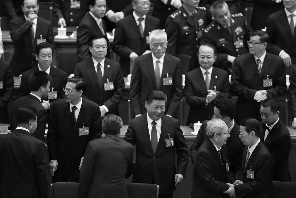  Chinese leader Xi Jinping waves as he leaves after the closing of the 19th Communist Party Congress at the Great Hall of the People in Beijing, China on Oct. 24, 2017. (Lintao Zhang/Getty Images)